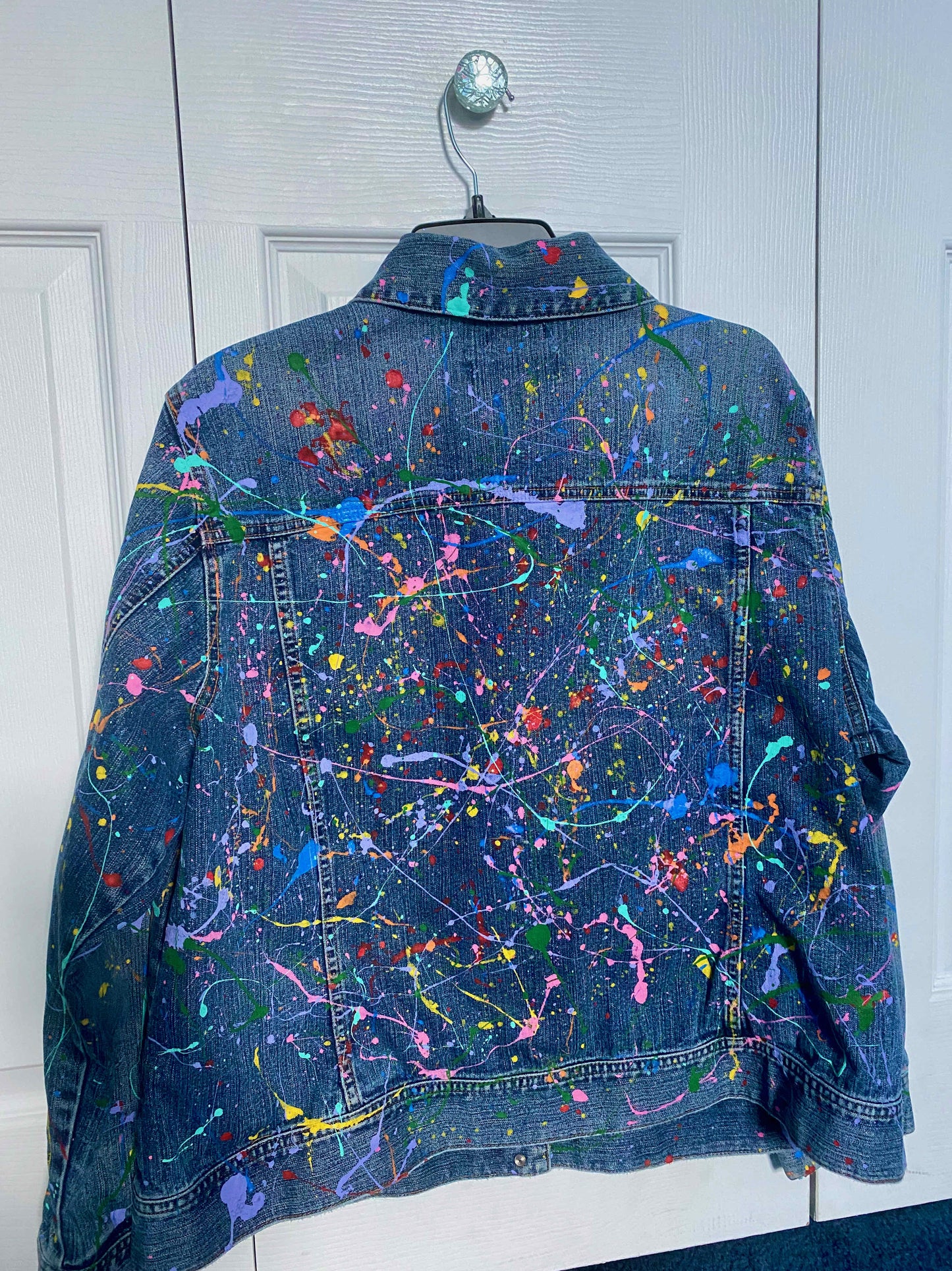 This is a one of kind custom splatter paint denim jacket that is meant to make a statement. This jacket was hand painted and carefully designed. 