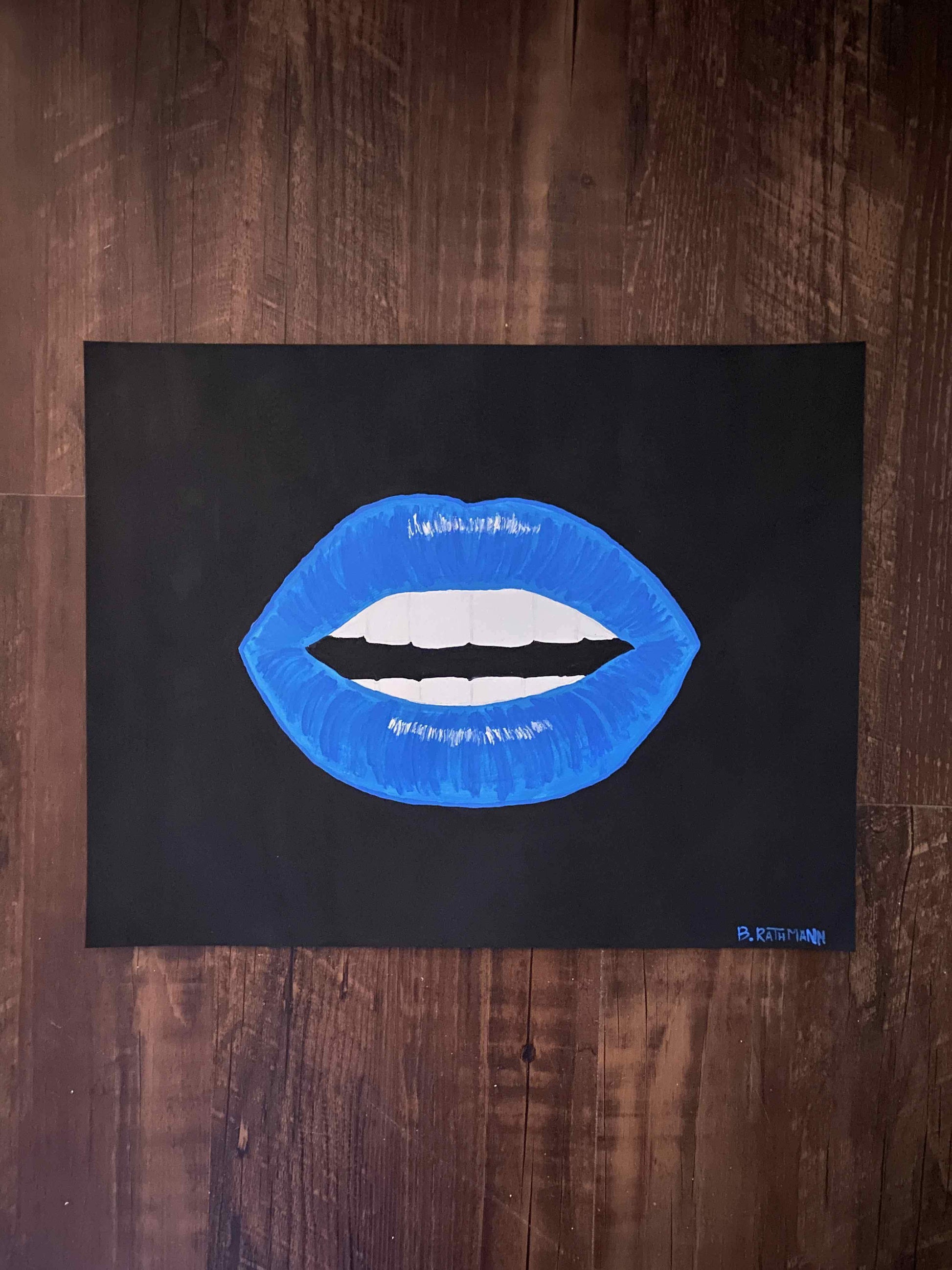 This is an original acrylic painting on heavy paper. The bright blue lips are centered on a black background.