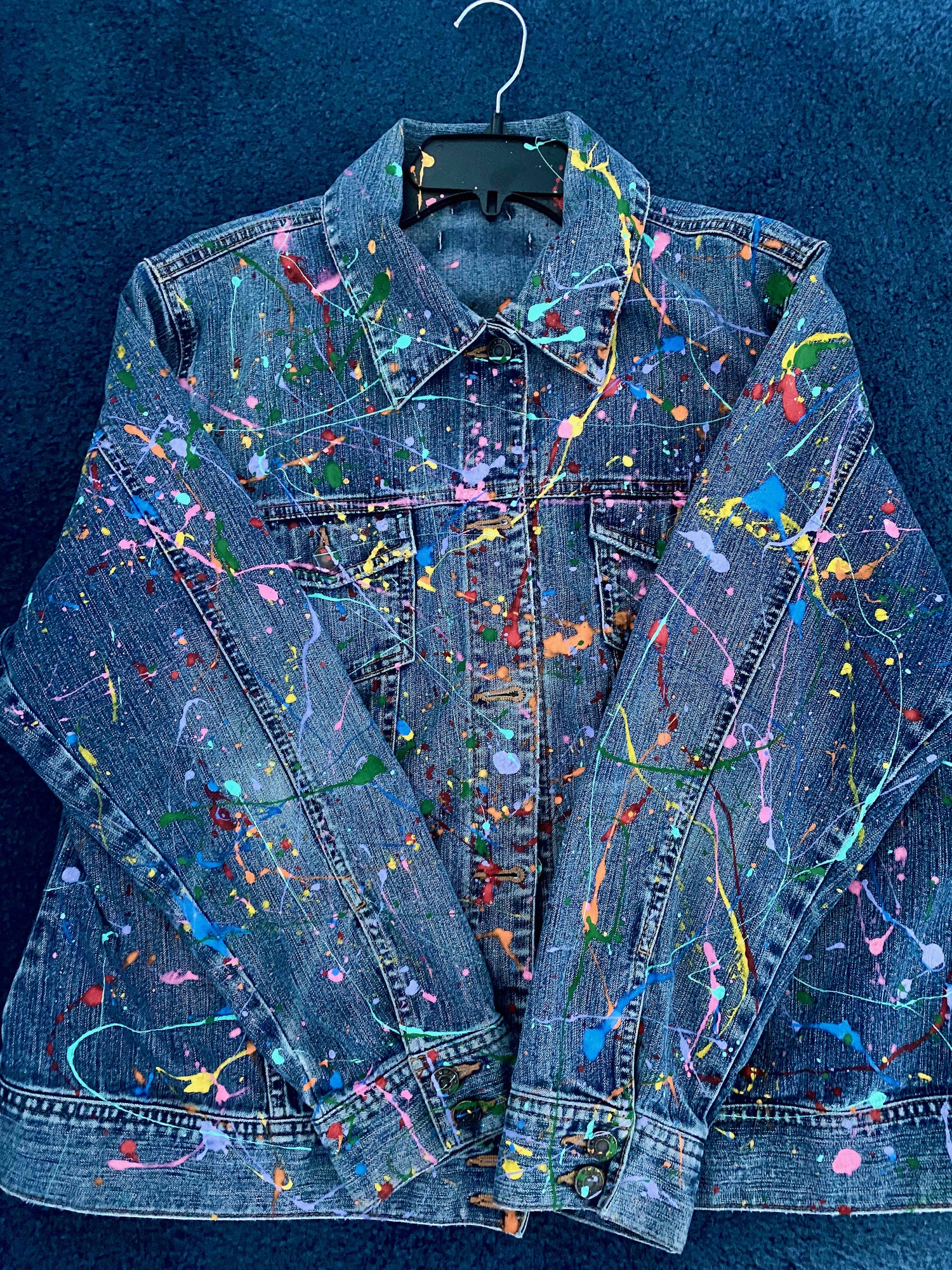 This is a one of kind custom splatter paint denim jacket that is meant to make a statement. This jacket was hand painted and carefully designed. 